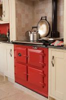 Red aga in modern kitchen