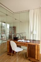 Modern study in glass cubicle 