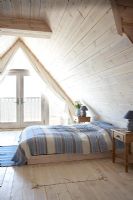 Modern bedroom in beach house 