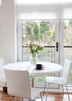 Modern white dining table and chairs 