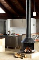 Modern kitchen and wood burning stove