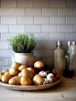 Food and accessories on kitchen worktop