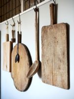 Wooden chopping boards and utensils, detail