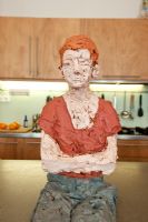 Painted clay figure in kitchen