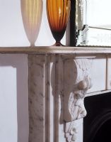 Brown glass vase on mantelpiece