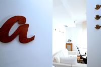 Giant wooden lettering on living room wall