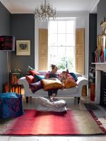 Woman and child in colourful living room