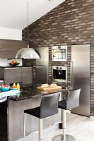 Modern kitchen with feature wall