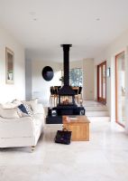Modern living room with wood burning stove 