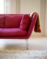 Pink sofa and furry rug