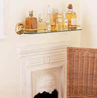 Perfumes on glass shelf