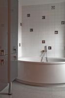 Contemporary bathroom with circular bath