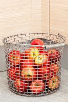 Apples in metal basket
