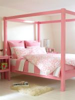 Modern pink four poster bed 