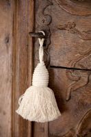 String tassel on classic door key detail 