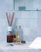 Toiletries and accesssories on bathroom shelf