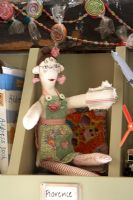 Rag doll on kitchen shelf detail 
