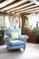 Classic armchair in country living room 
