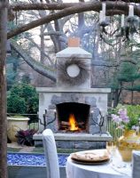 Outdoor fireplace and dining area 