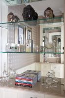 Detail of glass shelves in bathroom 