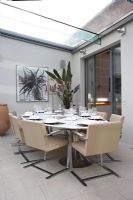 Modern dining room in conservatory 