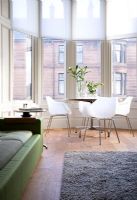 Dining table and chairs in modern living room 