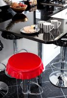 Red stool in kitchen