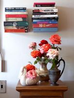 Vases of flowers on side table