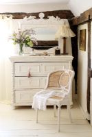 Chest of drawers in country bedroom 