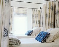 Classic twin four poster beds
