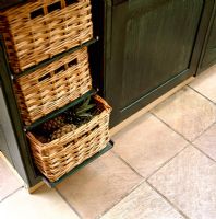 Detail of basket drawers in classic kitchen 