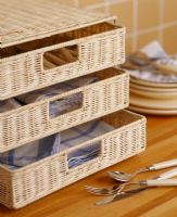 Set of wicker drawers on kitchen worktop 