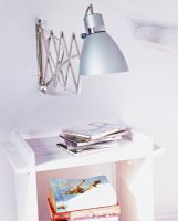 Extendable lamp above side table 