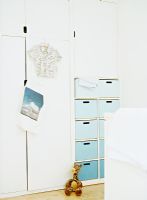 Wardrobe and chest of drawers in childrens room