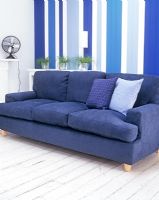 Modern blue sofa in living room 