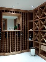 Wooden shelves and racks in wine cellar 