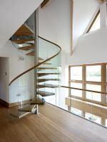 Contemporary hallway and spiral staircase 