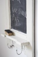 Vintage blackboard notice board and shelf