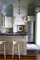 Bar stools in classic kitchen 