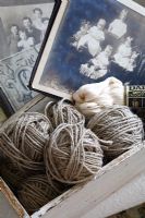 Detail of vintage photographs and wool 
