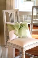 Cushion with large bow on classic chair 
