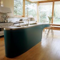 Curved island in contemporary kitchen 