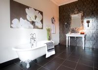 Modern bathroom with patterned tiled wall 