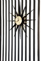 Clock and stripy wallpaper