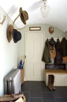 Country style entrance hall with storage