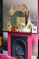 Rococo style overmantel and pink painted fireplace
