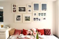 Display of photos in kitchen diner
