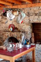 Rustic stone kitchen with fire