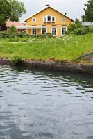 Traditional Swedish riverside house