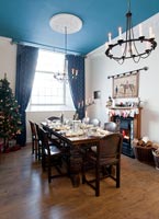 Dining room decorated for Christmas meal